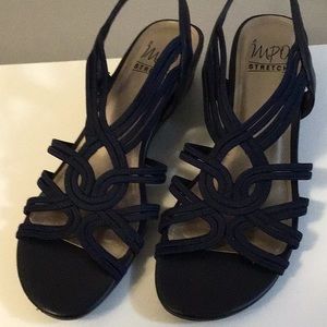 Ladies stretch navy sandles. 1.5 inch heels.